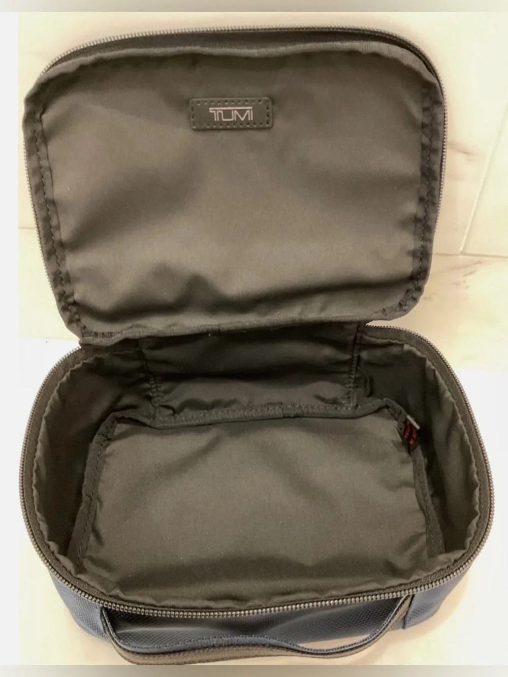 Tumi up sale